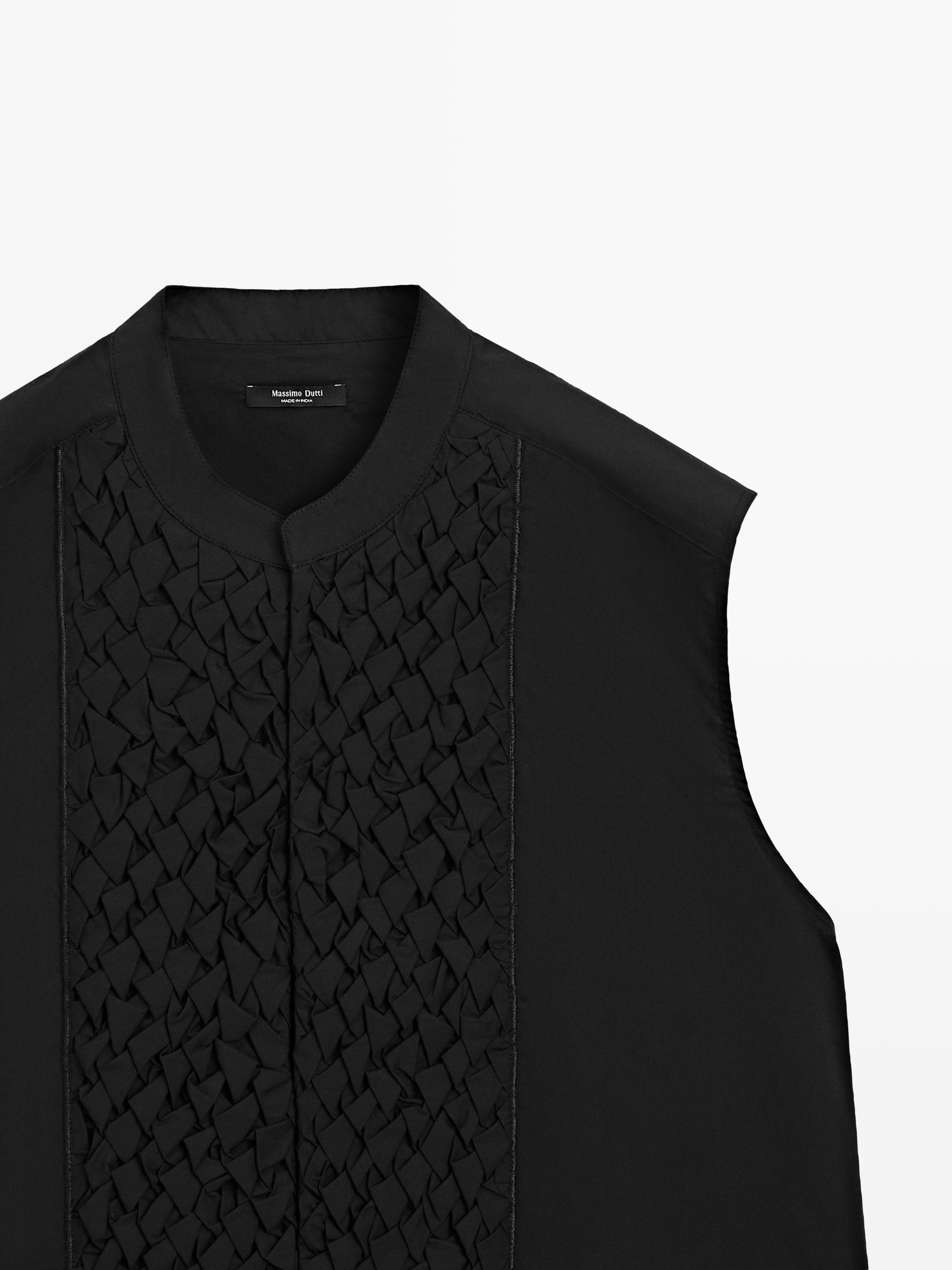 Veste sans manches en coton à plastron
